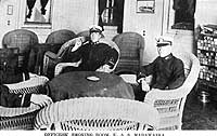 Photo # NH 103149: Scene in the officers' smoking room on USS Madawaska