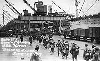 Photo # NH 104952: USS Huron embarking homeward-bound troops at American Bassens, France, 29 June 1919